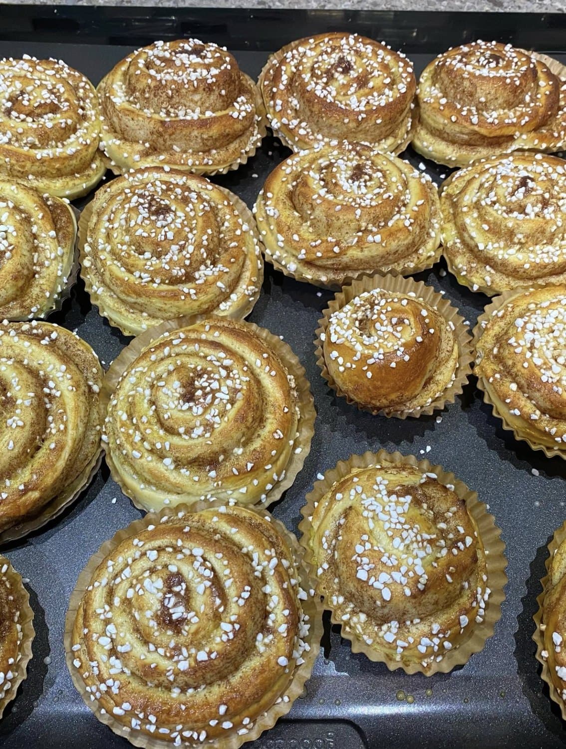 Trays of freshly baked Swedish cinnamon and cardamom buns